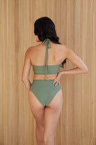 Back view of model wearing Isla High Waist bottom in agave